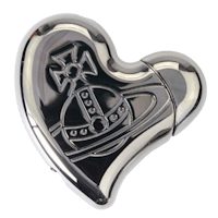 a heart shaped metal lighter with a cross on it