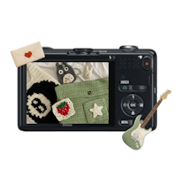 a camera with a guitar and other items