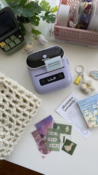 a desk with various items on it
